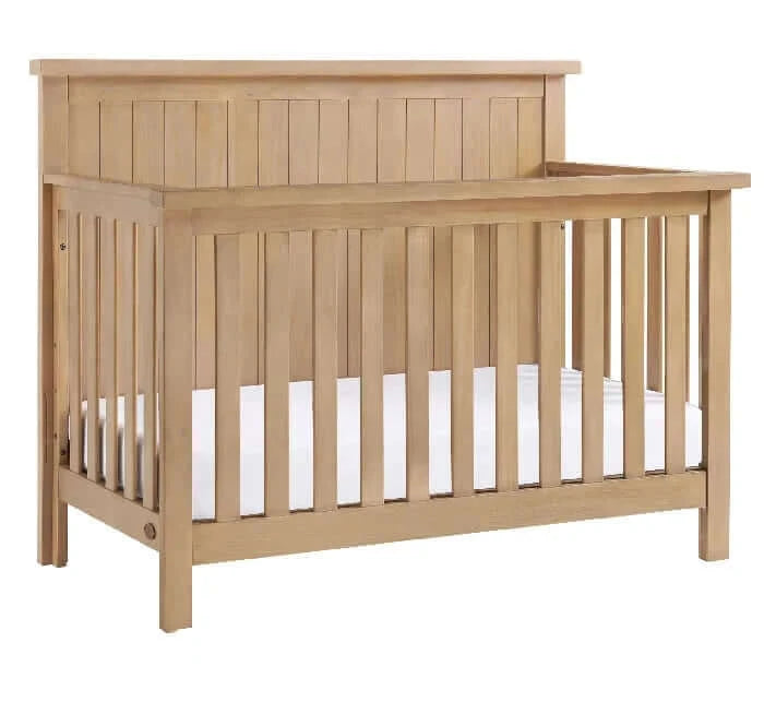 Everlee 4-In-1 Convertible Crib - Honey Wood crib side 