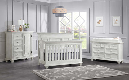 Weston 4 In 1 Convertible Crib - Lifestyle Image Inclined Side View of Weston 4 In 1 Convertible Crib Vintage White